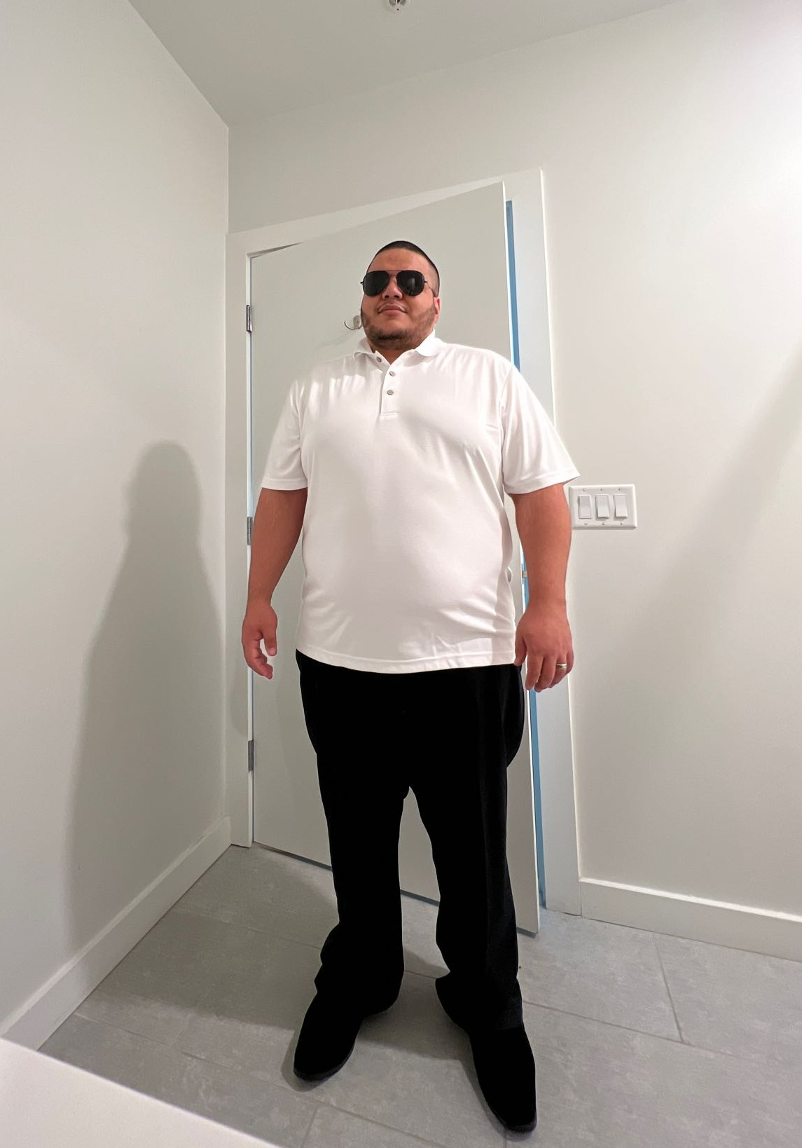 Danny Romero, the Blind Radio Guy, in a full outfit portrait